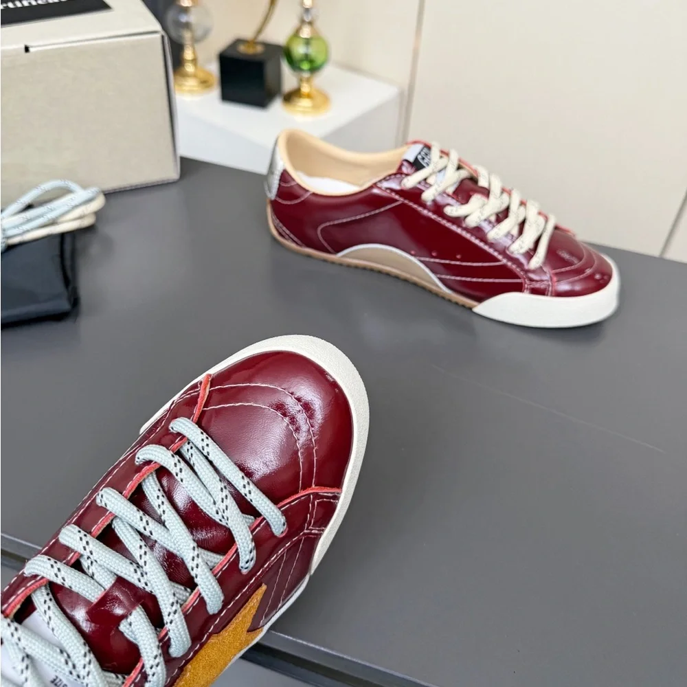Golden Goose Women's Burgundy Leather Low-Top Sneakers with White Soles